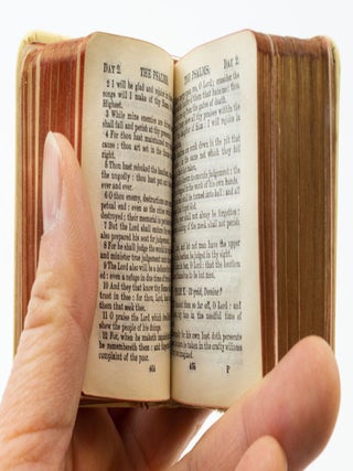 A SMALL COLLECTION OF DESIRABLE MINIATURE BOOKS, OFFERED AS A GROUP.