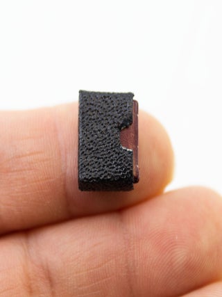 A SMALL COLLECTION OF DESIRABLE MINIATURE BOOKS, OFFERED AS A GROUP.