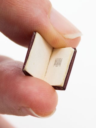 A SMALL COLLECTION OF DESIRABLE MINIATURE BOOKS, OFFERED AS A GROUP.