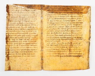 THE LEAVES FROM A LECTIONARY IN LATIN, WITH TEXTS FROM JOHN AND EXODUS on one leaf and LUKE, LEVITICUS AND DANIEL on the other.