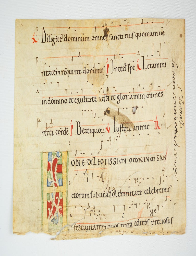 (ST20978) TEXT FROM THE FEAST OF ALL SAINTS. WITH A. FINE ROMANESQUE INITIAL A MEDIEVAL...